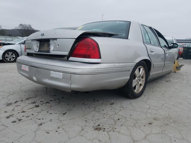 Photo 4 from auction – 2004 FORD CROWN VICT with VIN 2FDHP74W54X168335