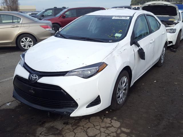 Photo 2 from auction – 2018 TOYOTA COROLLA L with VIN 5YFBURHE9JP789791