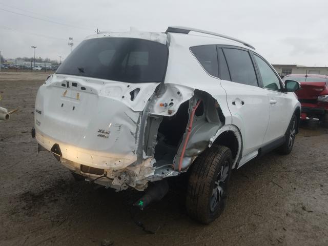 Photo 4 from auction – 2018 TOYOTA RAV4 ADVEN with VIN 2T3RFREV2JW853513
