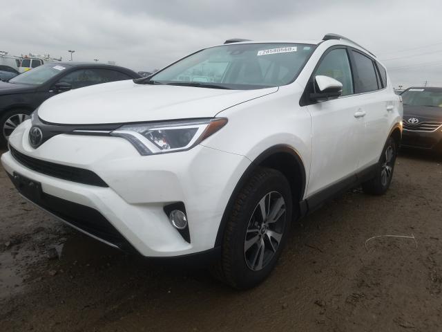 Photo 2 from auction – 2018 TOYOTA RAV4 ADVEN with VIN 2T3RFREV2JW853513