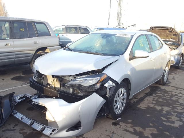 Photo 2 from auction – 2018 TOYOTA COROLLA L with VIN 5YFBURHE9JP831604