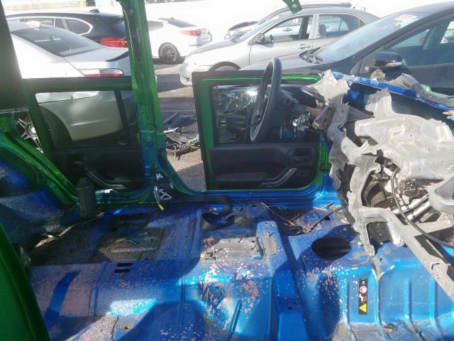 Photo 5 from auction – 2015 JEEP WRANGLER U with VIN 1C4BJWFG2FL728911
