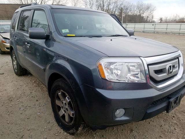 HONDA PILOT TOUR 2011 with VIN 5FNYF4H91BB100530 - Photo from auction