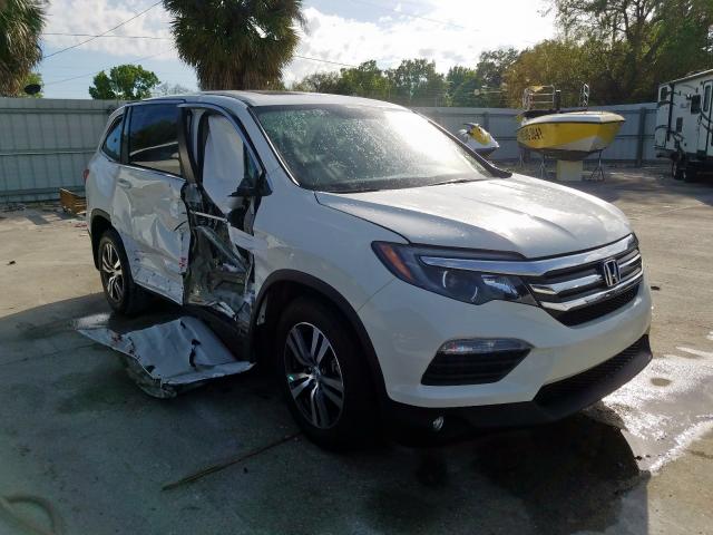HONDA PILOT EXL 2018 with VIN 5FNYF5H51JB018380 - Photo from auction