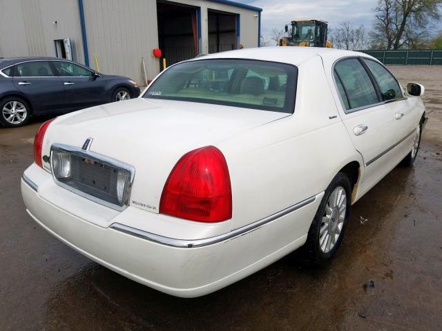 Photo 4 from auction – 2003 LINCOLN TOWN CAR E with VIN 1LNHM81W43Y625947