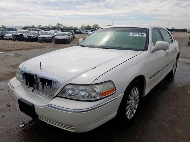 Photo 2 from auction – 2003 LINCOLN TOWN CAR E with VIN 1LNHM81W43Y625947