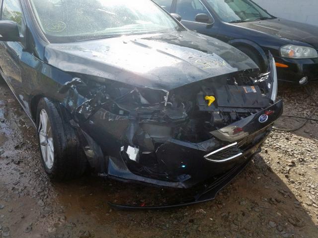Photo 9 from auction – 2015 FORD FOCUS SE with VIN 1FADP3K24FL212930