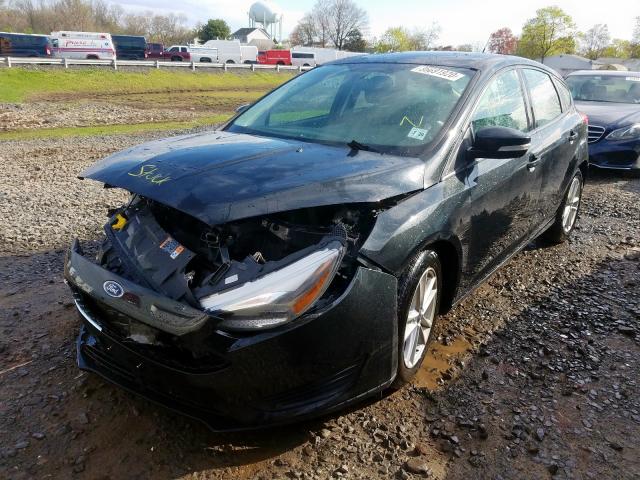 Photo 2 from auction – 2015 FORD FOCUS SE with VIN 1FADP3K24FL212930