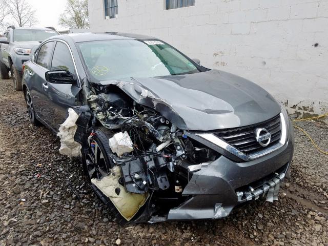 NISSAN ALTIMA 2.5 2018 with VIN 1N4AL3AP9JC100984 - Photo from auction