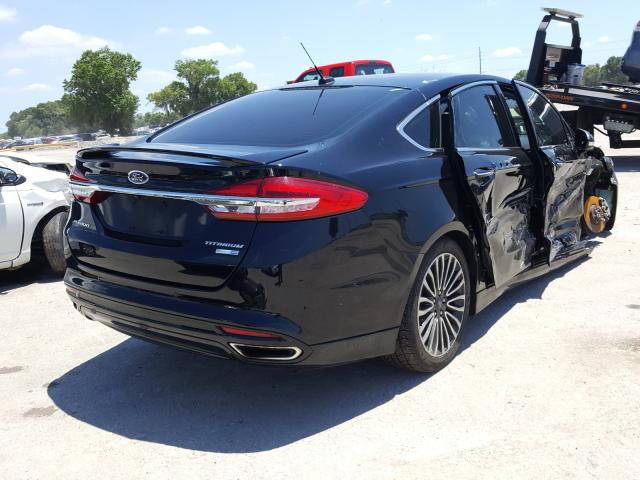 Photo 4 from auction – 2018 FORD FUSION TIT with VIN 3FA6P0D9XJR134178