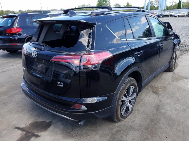 Photo 4 from auction – 2018 TOYOTA RAV4 ADVEN with VIN 2T3RFREV7JW831555