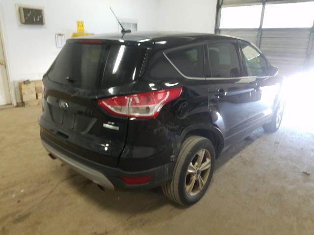 Photo 4 from auction – 2014 FORD ESCAPE SE with VIN 1FMCU0GXXEUA91634