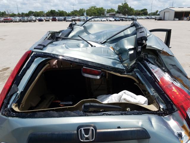 Photo 10 from auction – 2011 HONDA CR-V SE with VIN 5J6RE3H4XBL010502