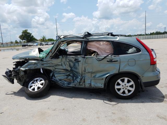 Photo 9 from auction – 2011 HONDA CR-V SE with VIN 5J6RE3H4XBL010502