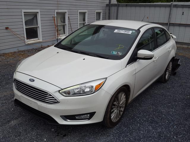 Photo 2 from auction – 2015 FORD FOCUS TITA with VIN 1FADP3J2XFL321409