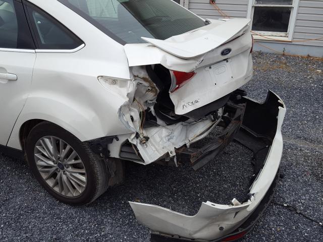 Photo 9 from auction – 2015 FORD FOCUS TITA with VIN 1FADP3J2XFL321409