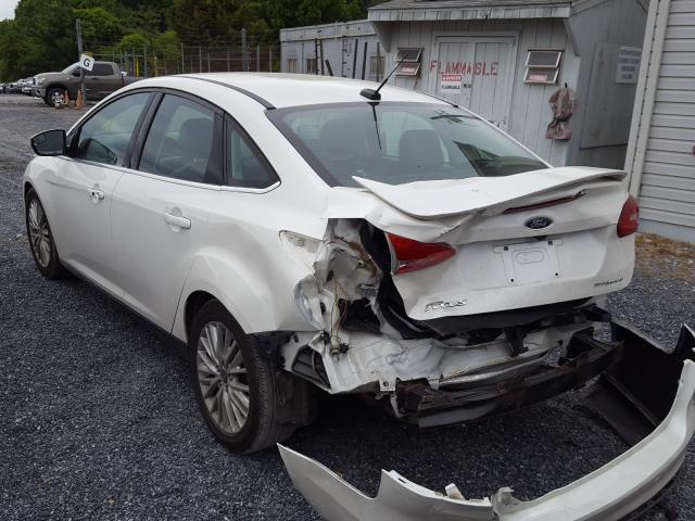 Photo 3 from auction – 2015 FORD FOCUS TITA with VIN 1FADP3J2XFL321409