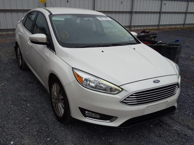 FORD FOCUS TITA 2015 with VIN 1FADP3J2XFL321409 - Photo from auction