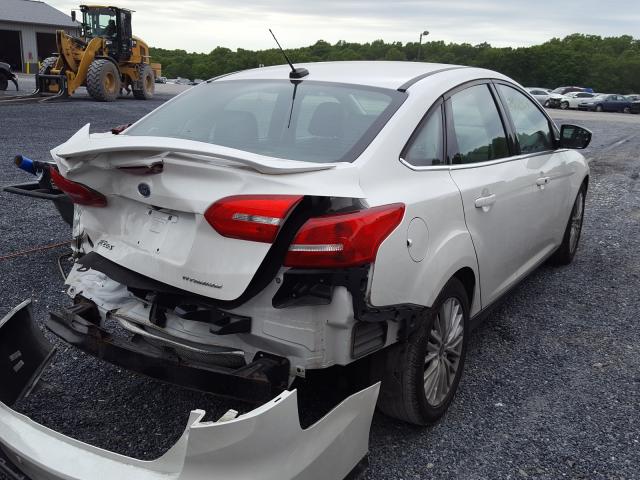 Photo 4 from auction – 2015 FORD FOCUS TITA with VIN 1FADP3J2XFL321409