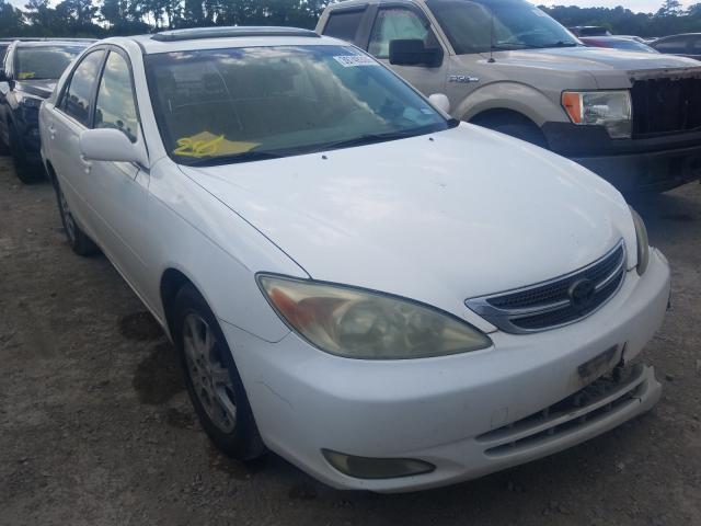 TOYOTA CAMRY LE 2004 with VIN JTDBE32K340274891 - Photo from auction