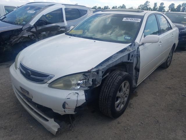 Photo 2 from auction – 2004 TOYOTA CAMRY LE with VIN JTDBE32K340274891