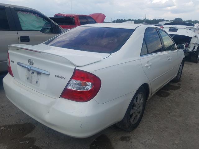 Photo 4 from auction – 2004 TOYOTA CAMRY LE with VIN JTDBE32K340274891