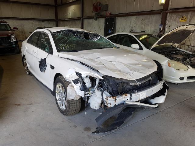 FORD TAURUS SHO 2018 with VIN 1FAHP2KT0JG105038 - Photo from auction