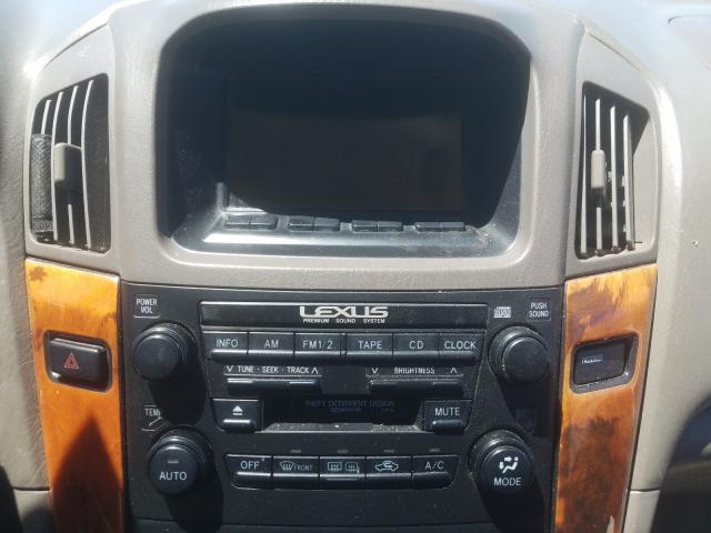Photo 9 from auction – 1999 LEXUS RX 300 with VIN JT6HF10U2X0090683
