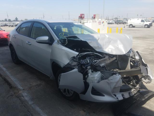 TOYOTA COROLLA 2018 with VIN 2T1BURHE0JC031886 - Photo from auction