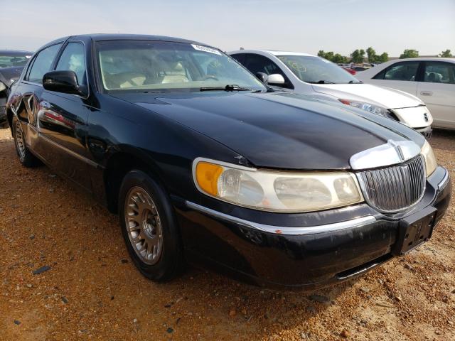 LINCOLN TOWN CAR C 2000 with VIN 1LNHM83W4YY784293 - Photo from auction