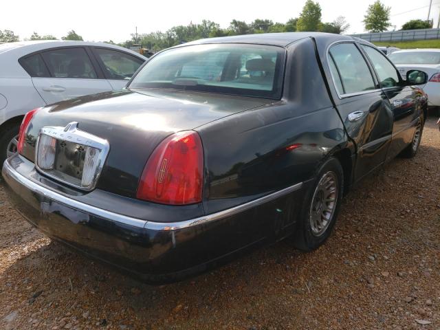 Photo 4 from auction – 2000 LINCOLN TOWN CAR C with VIN 1LNHM83W4YY784293