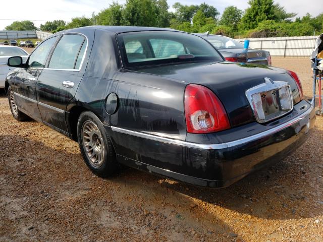 Photo 3 from auction – 2000 LINCOLN TOWN CAR C with VIN 1LNHM83W4YY784293