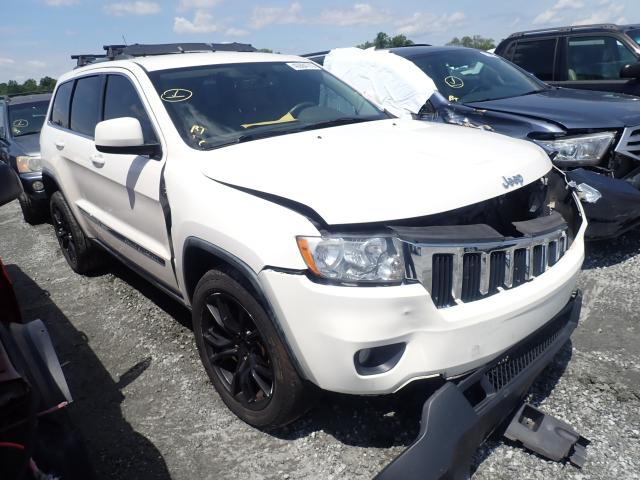 JEEP GRAND CHER 2011 with VIN 1J4RS4GG2BC524256 - Photo from auction