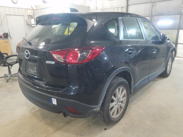 Photo 4 from auction – 2014 MAZDA CX-5 SPORT with VIN JM3KE2BE8E0338694