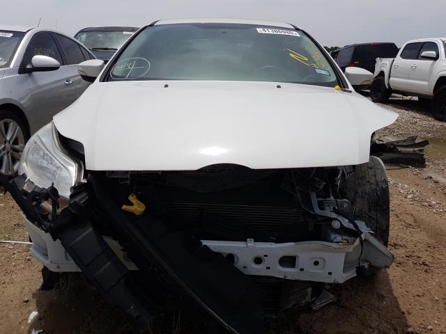 Photo 9 from auction – 2014 FORD FOCUS SE with VIN 1FADP3F23EL275980