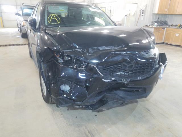 Photo 9 from auction – 2014 MAZDA CX-5 SPORT with VIN JM3KE2BE8E0338694