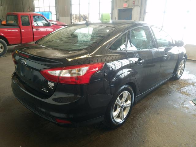 Photo 4 from auction – 2014 FORD FOCUS SE with VIN 1FADP3F28EL101659