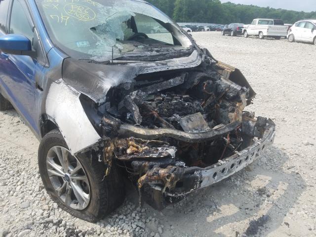 Photo 9 from auction – 2019 FORD ESCAPE SE with VIN 1FMCU9GD3KUA00340