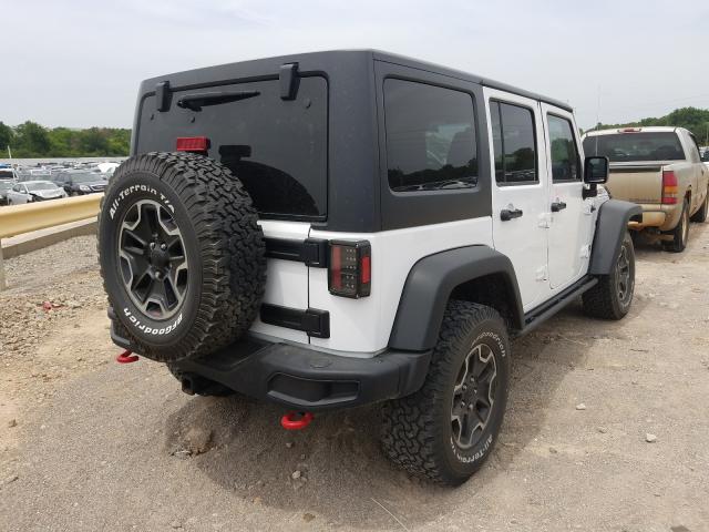 Photo 4 from auction – 2013 JEEP WRANGLER U with VIN 1C4BJWFG5DL646829