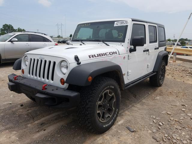 Photo 2 from auction – 2013 JEEP WRANGLER U with VIN 1C4BJWFG5DL646829