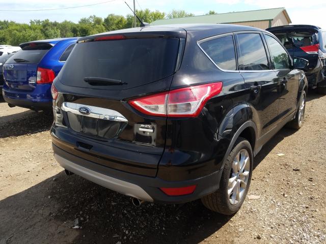 Photo 4 from auction – 2013 FORD ESCAPE SEL with VIN 1FMCU9H95DUA59791