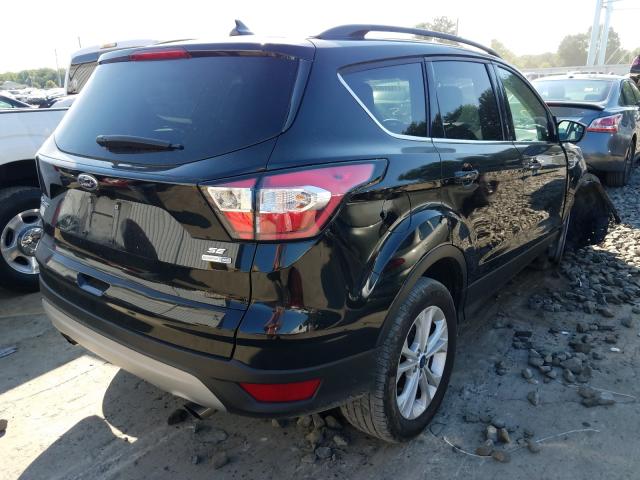 Photo 4 from auction – 2018 FORD ESCAPE SE with VIN 1FMCU9GD1JUA77710