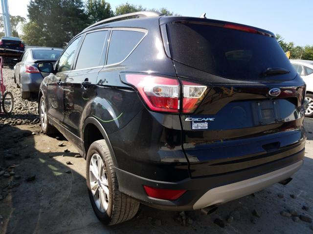 Photo 3 from auction – 2018 FORD ESCAPE SE with VIN 1FMCU9GD1JUA77710