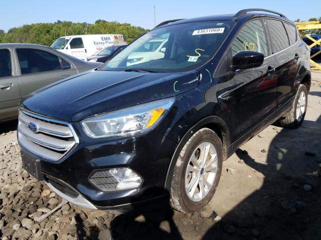 Photo 2 from auction – 2018 FORD ESCAPE SE with VIN 1FMCU9GD1JUA77710