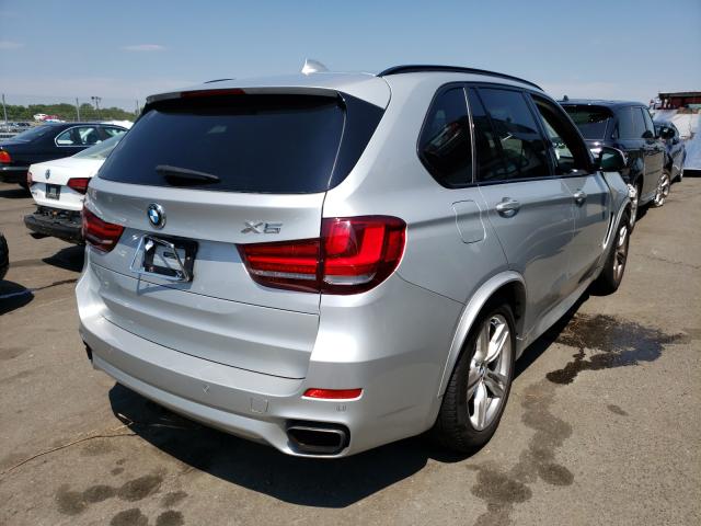 Photo 4 from auction – 2014 BMW X5 XDRIVE5 with VIN 5UXKR6C5XE0J72647