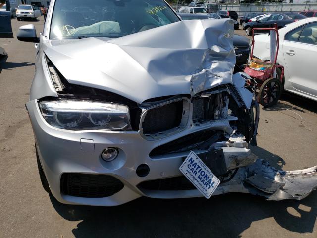 Photo 7 from auction – 2014 BMW X5 XDRIVE5 with VIN 5UXKR6C5XE0J72647