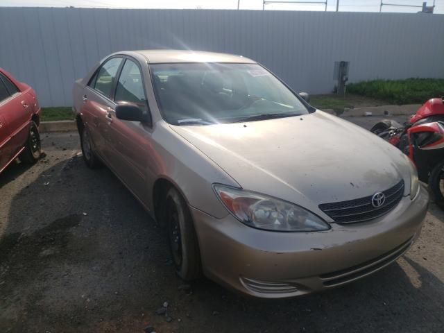 TOYOTA CAMRY LE 2002 with VIN 4T1BF32K32U034299 - Photo from auction