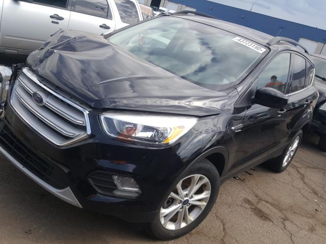 Photo 2 from auction – 2018 FORD ESCAPE SE with VIN 1FMCU9GD2JUB09323
