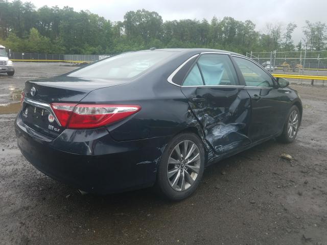 Photo 4 from auction – 2016 TOYOTA CAMRY HYBR with VIN 4T1BD1FK8GU192648