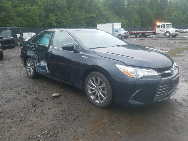 TOYOTA CAMRY HYBR 2016 with VIN 4T1BD1FK8GU192648 - Photo from auction